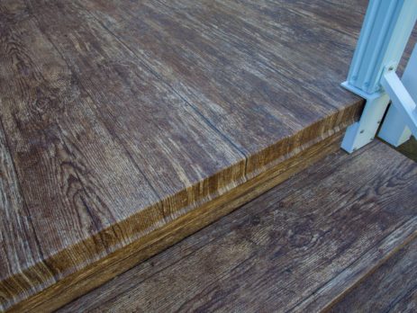Close up of vinyl plank flooring on outdoor deck and stairs