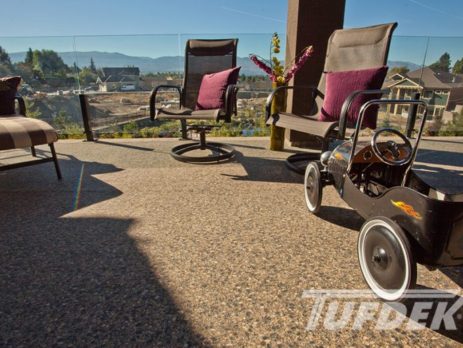 Deck furniture and peddle car on PVC vinyl covered deck
