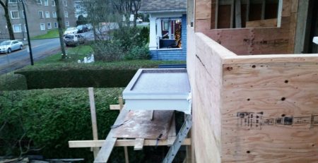 Home under construction with waterproof vinyl flooring on balcony