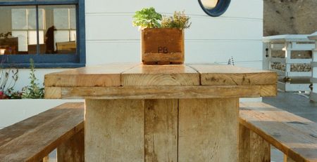 IMAGE OF WOODEN DECK TABLE AND BENCHES
