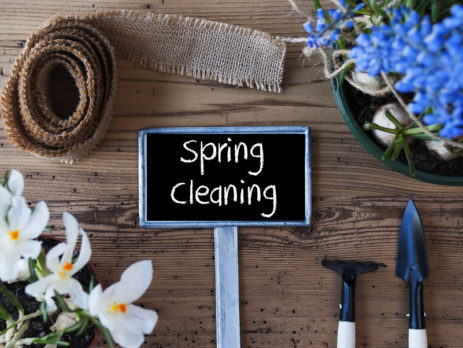IMAGE OF SPRING CLEANING SIGN ON WOODEN TABLE