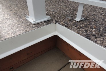 Tufdek-BrownstoneAggregate-HeatWeldedToPVCFlashingInsideCornerDetail Decking Details Photo Gallery
