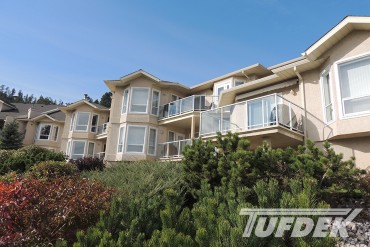 Tufdek-SupremeWalnut-WaterProofingDecksOnCondoProject-Kelowna Multi Family Deck Images